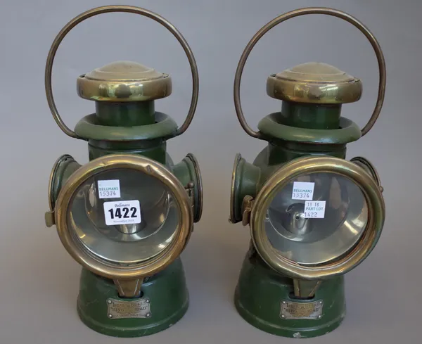 A pair of 4 inch Lucas 'King of the Road' green painted brass cased automobile oil lamps. (2)