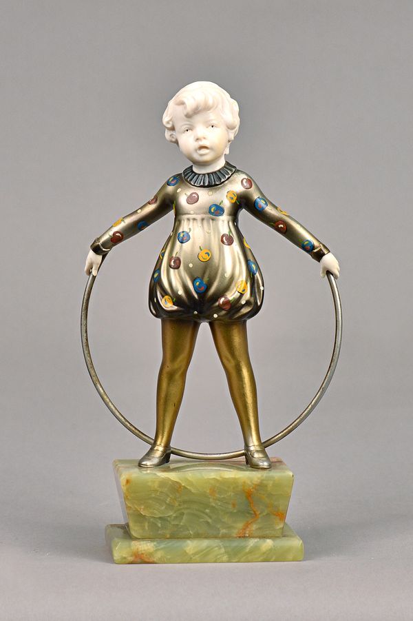 Josef Lorenzl, Hoop Girl, an Art Deco silvered bronze and carved ivory study, circa 1920s, 20.5cm high. Illustrated.
