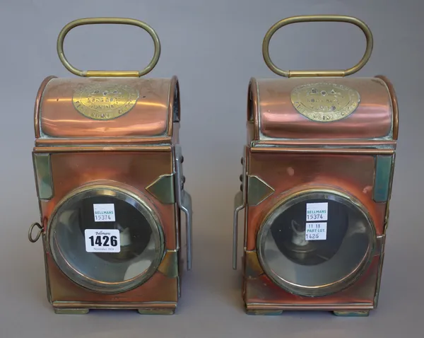 A pair of 4 inch Merryweather copper and brass cased automobile oil lamps. (2)