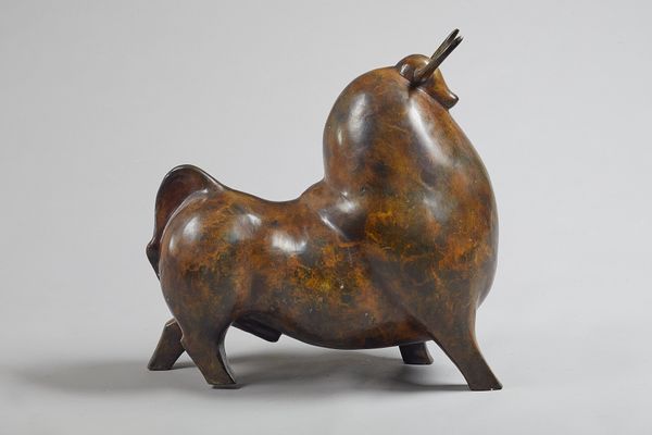 A Botero style patinated bronze bull, unsigned, 56cm high. Illustrated.