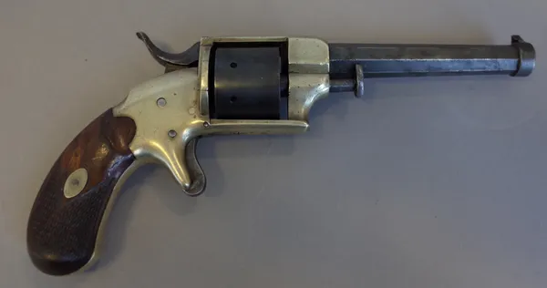 A German Union made .30 calibre seven shot cylinder revolver, with octagonal steel barrel, brass body and two piece chequered walnut grip, 22.5cm over