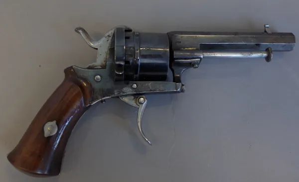 A 19th century Belgian six shot pinfire revolver or Velo Dog, with octagonal barrel, folding trigger and two piece walnut grip, 19.5cm overall.