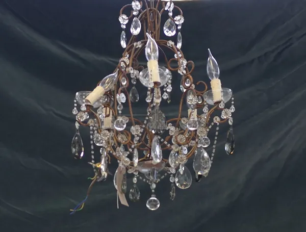 A modern gilt metal five branch chandelier, the stem issuing five swan neck branches united by beaded chains and hung with clear and amethyst drops (5
