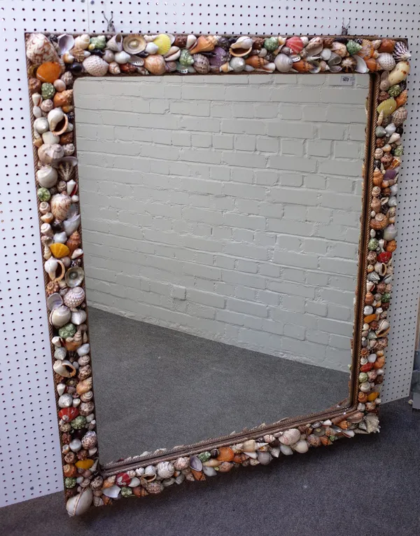An Anthony Redmile style rectangular wall mirror with wide shell and rope bound border, 150cm x 120cm.