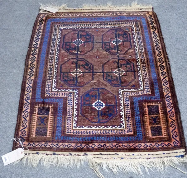 An Afghan Taimani prayer rug, the natural mehrab with four fret guls, an indigo border, 124cm x 88cm and a Yomut Torba, madder field with octagonal fl