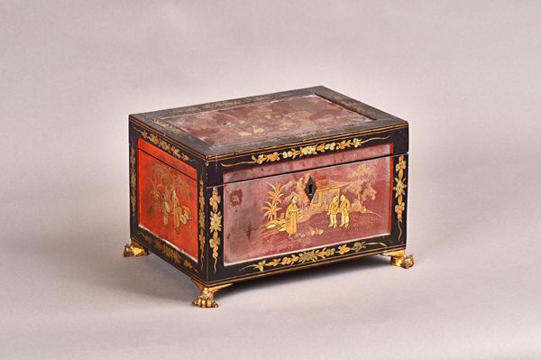 A 19th century Chinese export scarlet, gilt and black lacquer rectangular tea caddy, with pewter twin lidded interior on gilt paw feet, 25cm wide x 15