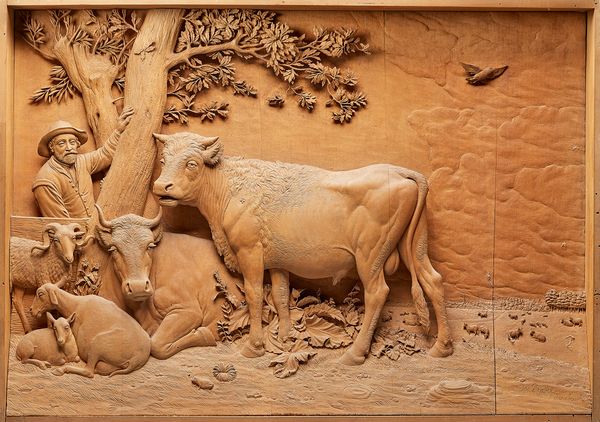 Joseph Graber Innsbruck, a late 19th century lime wood diorama carved in relief with a figure in a wooded landscape amongst livestock, the panel 56cm