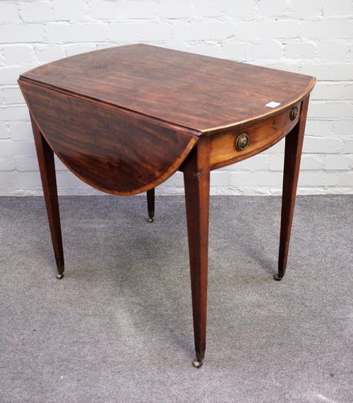 A George III mahogany Pembroke table, the oval top above bow frieze drawer and dummy opposing on tapering square supports, 51cm across x 94cm across o