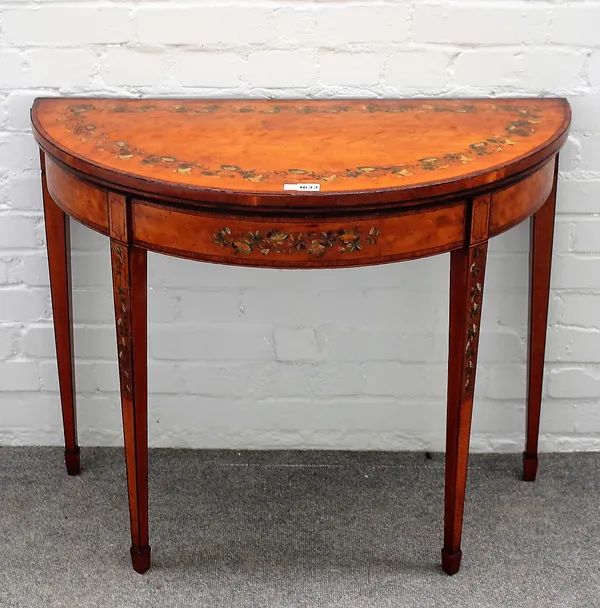 A George III tulipwood banded satinwood semi-elliptic card table, polychrome painted with floral sprays on tapering square supports, 91cm wide x 74cm