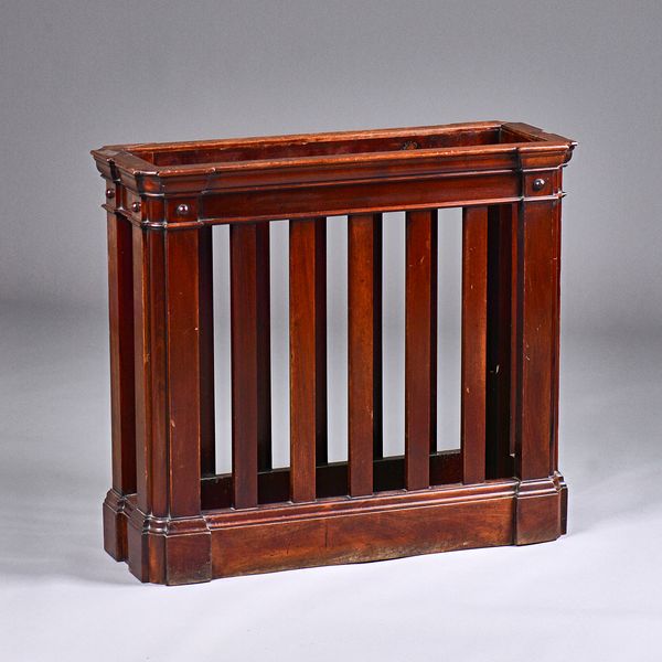 A Regency mahogany rectangular twelve division stick stand with open slatted sides, 77cm wide x 68cm high x 28cm deep. Illustrated.