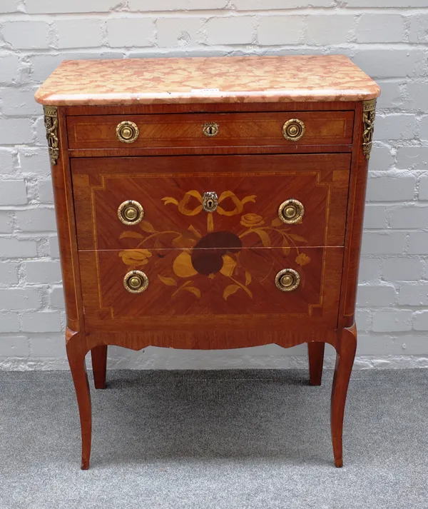 A Louis XV style petite commode, the marble top over a gilt metal mounted marquetry inlaid mahogany and kingwood three drawer base, on cabriole suppor
