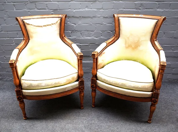 A pair of Louis XVI style stained beech armchairs, with bow seat on baluster turned supports, 59cm wide x 86cm high, (2).