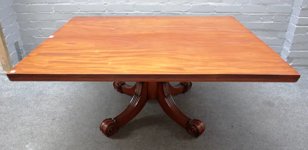 A rectangular mahogany coffee table on reeded column and four downswept supports, adapted from a George III supper table, 100cm wide x 54cm high x 126