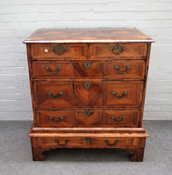 A William and Mary crossbanded kingwood and rosewood chest on stand with two short over three long graduated drawers on shaped bracket feet, reduced,