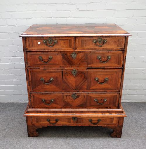 A William and Mary crossbanded kingwood and rosewood chest on stand with two short over three long graduated drawers on shaped bracket feet, reduced,
