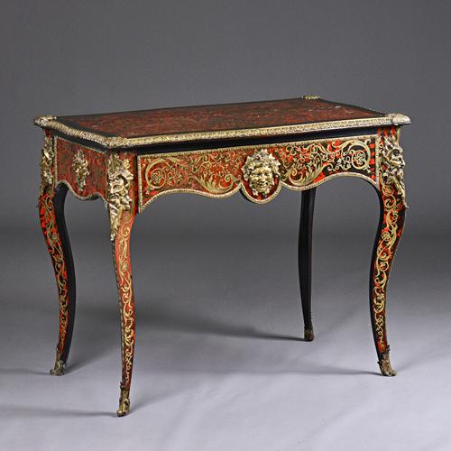 A 19th century French gilt metal mounted boulle work centre table, with secret sprung frieze drawer on cabriole supports, 90cm wide x 74cm high x 55cm