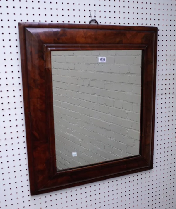 A William and Mary walnut rectangular cushion framed wall mirror, 67cm wide x 75cm high.