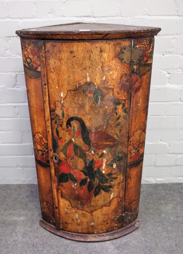 An 18th century Dutch polychrome painted hanging bowfront corner cupboard, 47cm wide x 89cm high.