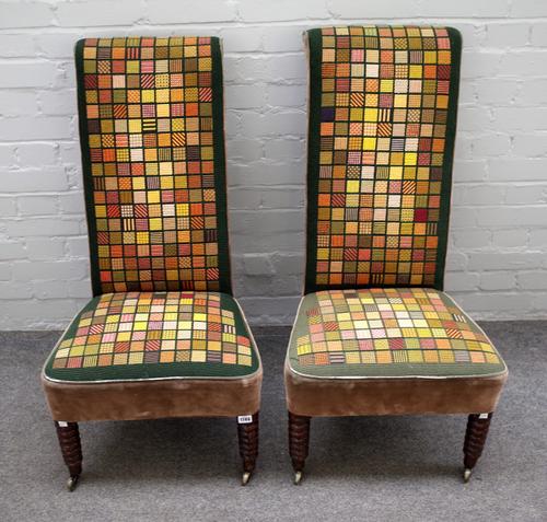 A pair of early 19th century walnut framed prie-dieu on ring turned front supports, 50cm wide x 97cm high.