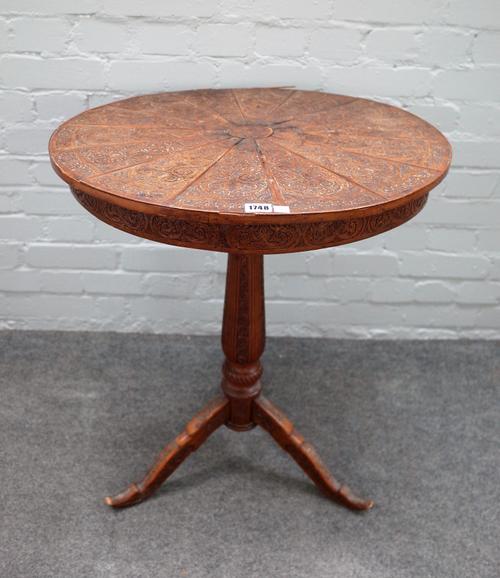 A 19th century Anglo-Indian hardwood circular tripod occasional table, with stellar veneered carved top, 62cm diameter x 72cm high.