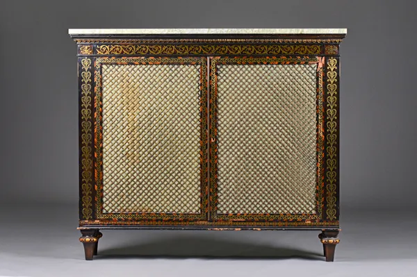 Possibly George Oakley; a mid-19th century brass inlaid coromandel side cabinet, the later rectangular marble top over pair of brass grille doors on t