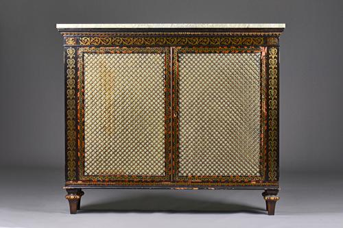 Possibly George Oakley; a mid-19th century brass inlaid coromandel side cabinet, the later rectangular marble top over pair of brass grille doors on t