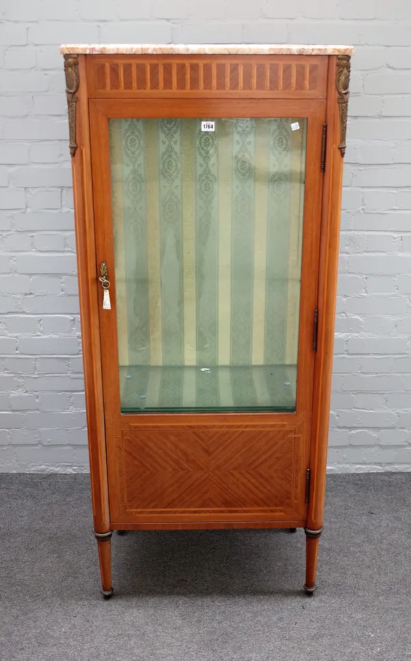 A late 19th century French gilt metal mounted parquetry inlaid kingwood vitrine, the marble top over three quarter glazed door on turned supports, 70c