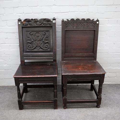 A 17th century oak side chair with carved floral panel back and solid seat on turned supports, united by perimeter stretcher, 49cm wide x 100cm high a