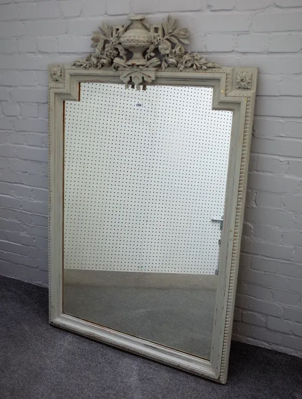 A 19th century later white painted rectangular wall mirror with urn crest about the stepped arched frame, 96cm wide x 156cm high.