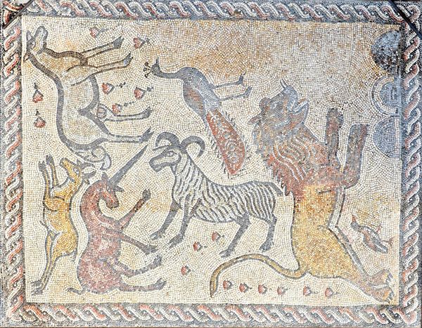 A Roman style large rectangular mosaic panel decorated with lion, peacock, gazelle and other animals, 211cm wide x 270cm high. Illustrated.