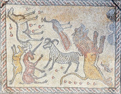 A Roman style large rectangular mosaic panel decorated with lion, peacock, gazelle and other animals, 211cm wide x 270cm high. Illustrated.