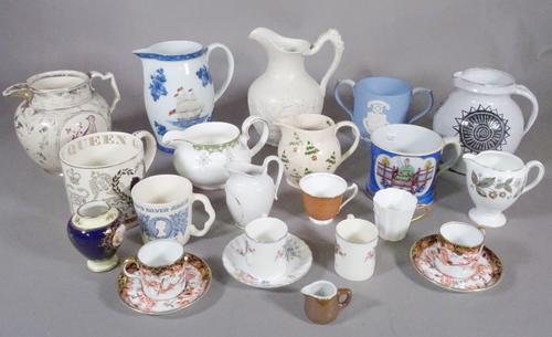Ceramics, including; a group of 19th century and later jugs, mugs and cups, a lustre jug, a Wedgwood twin handled cup and sundry, (qty)   S2M