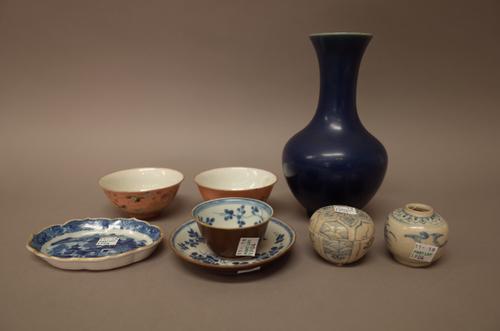 A pair of Chinese famille-rose teabowls, Daoguang seal marks, each painted with birds in branches, the reverse with script,  against a salmon-pink gro