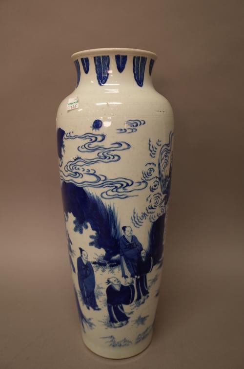 A Chinese blue and white sleeve vase, painted in transitional style with five Immortals looking up at another riding on the back of a bird in flight,