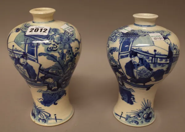 A pair of Chinese blue and white baluster vases, late 19th century, painted with an official and a woman playing the koto in a fenced garden, apochryp