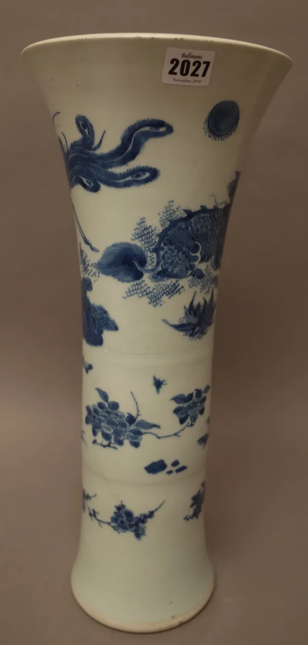 A Chinese transitional style gu vase, painted with a qilin, a phoenix, rocks and flowering branches, (a.f), 47cm. high.