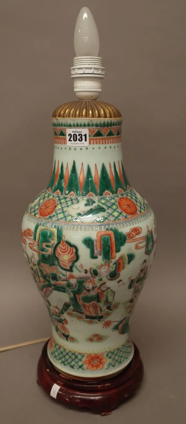 A Chinese famille-verte baluster vase, late 19th century, painted with officials and attendants in a landscape, 39cm. high, adapted as a lamp with woo