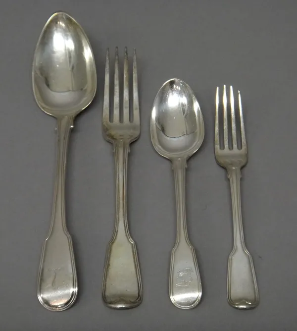 A group of silver double struck, fiddle and thread pattern table flatware, comprising; twelve tablespoons, twelve tableforks, twelve dessert forks and