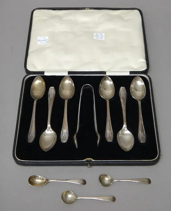 Silver, comprising; a set of six coffee spoons, Sheffield 1933 and a similar pair of sugar tongs, Sheffield 1931, with a case and three condiment spoo