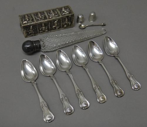 A set of six Scottish silver single struck teaspoons, Glasgow 1823, a Victorian silver mounted tapering faceted glass scent bottle, London 1891, two s