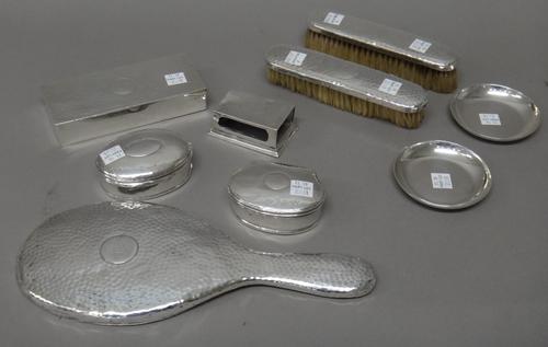 A group of silver mounted dressing table wares, comprising; a rectangular hinge lidded box, having four compartments, London 1904, two further hinge l