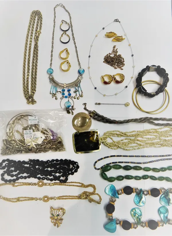 A gold mounted citrine pendant fob and a collection of silver and costume jewellery, including bangles, a bracelet detailed Mexico, neckchains, earrin