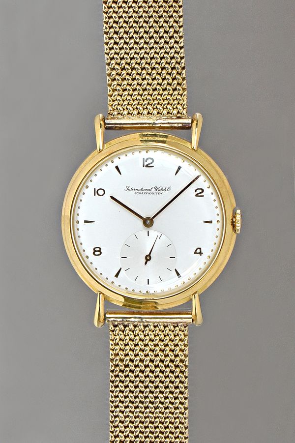 An International Watch Company Schaffhausen gold circular cased gentleman's wristwatch, circa 1947, the signed jewelled lever movement numbered 114044