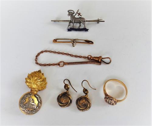 A gold, diamond and seed pearl set cluster ring, mounted with the cushion shaped diamond to the centre, in a surround of seed pearls, a pair of Victor