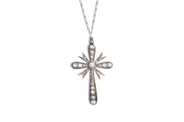 A diamond set pendant cross, apparently unmarked, probably central European, mounted with rose cut diamonds, with a neckchain, on a boltring clasp, le