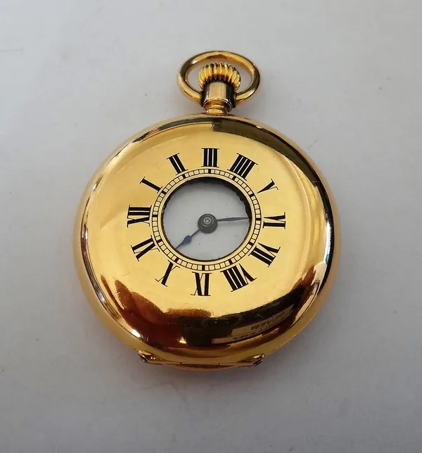 A gold cased, keyless wind, half hunting cased lady's fob watch, with an unsigned gilt jewelled cylinder movement, the gold inner case detailed No 589