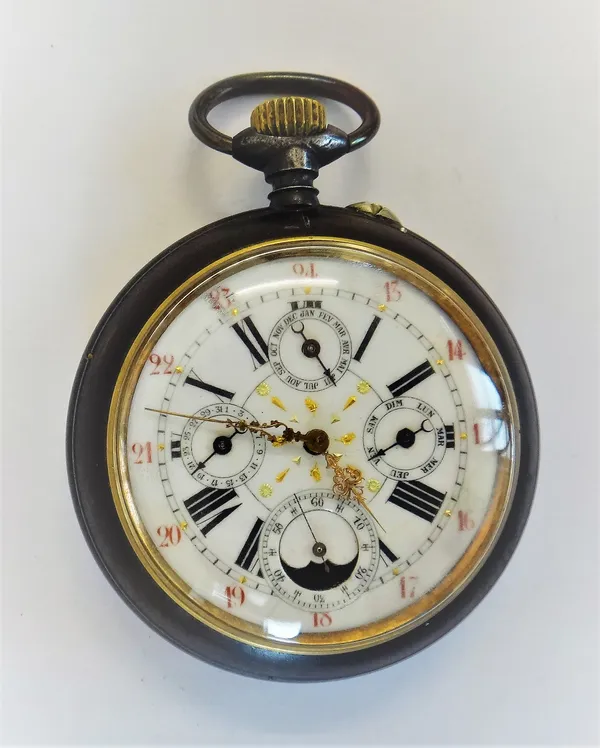 A gun metal cased, keyless wind, openfaced calendar large pocket watch, with an unsigned gilt jewelled movement, the enamelled dial with four subsidia