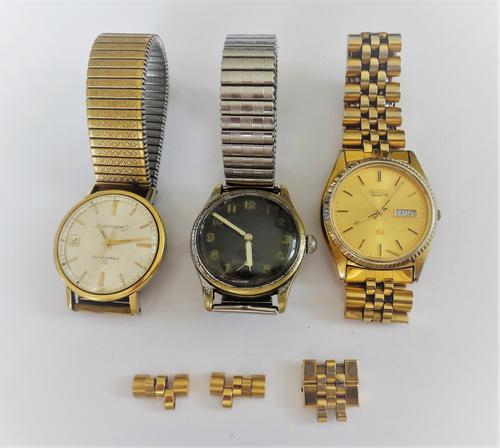 A Record Watch Company base metal circular cased gentleman's wristwatch, the signed black dial with Arabic numerals, detailed to the caseback STAHLBOD