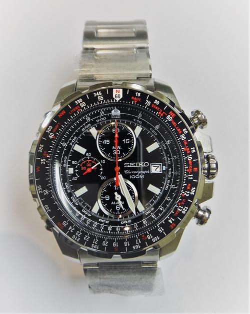 A Seiko Chronograph 100 M gentleman's steel bracelet wristwatch, the signed black dial with luminous baton numerals, outer Arabic numerals, three subs