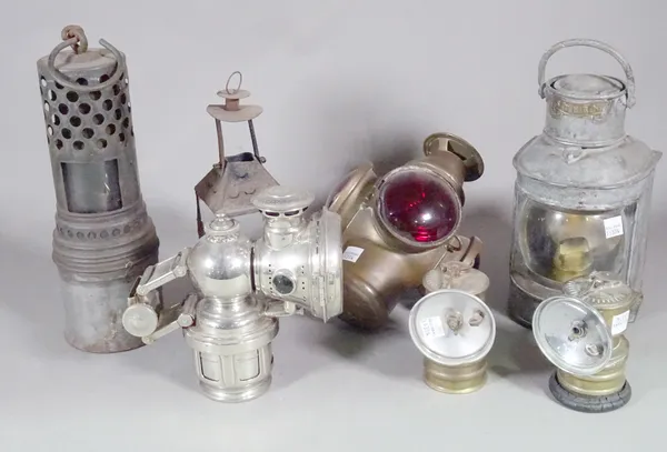A Lucas 'Calcai King' chromium cycle lamp, two 'Premier' carbide lamps, an 'Adlake' lamp, a ships 'stern' oil lamp, 'The Wolf' radiator lamp and one f